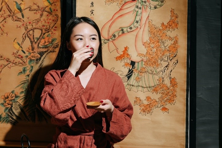 Chinese woman drinking tea